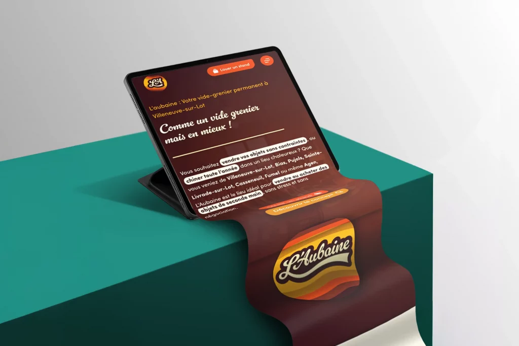 Site e-commerce L'Aubaine affiché sur tablette — vide-grenier permanent Villeneuve-sur-Lot réalisé par l'agence Terre Bleue